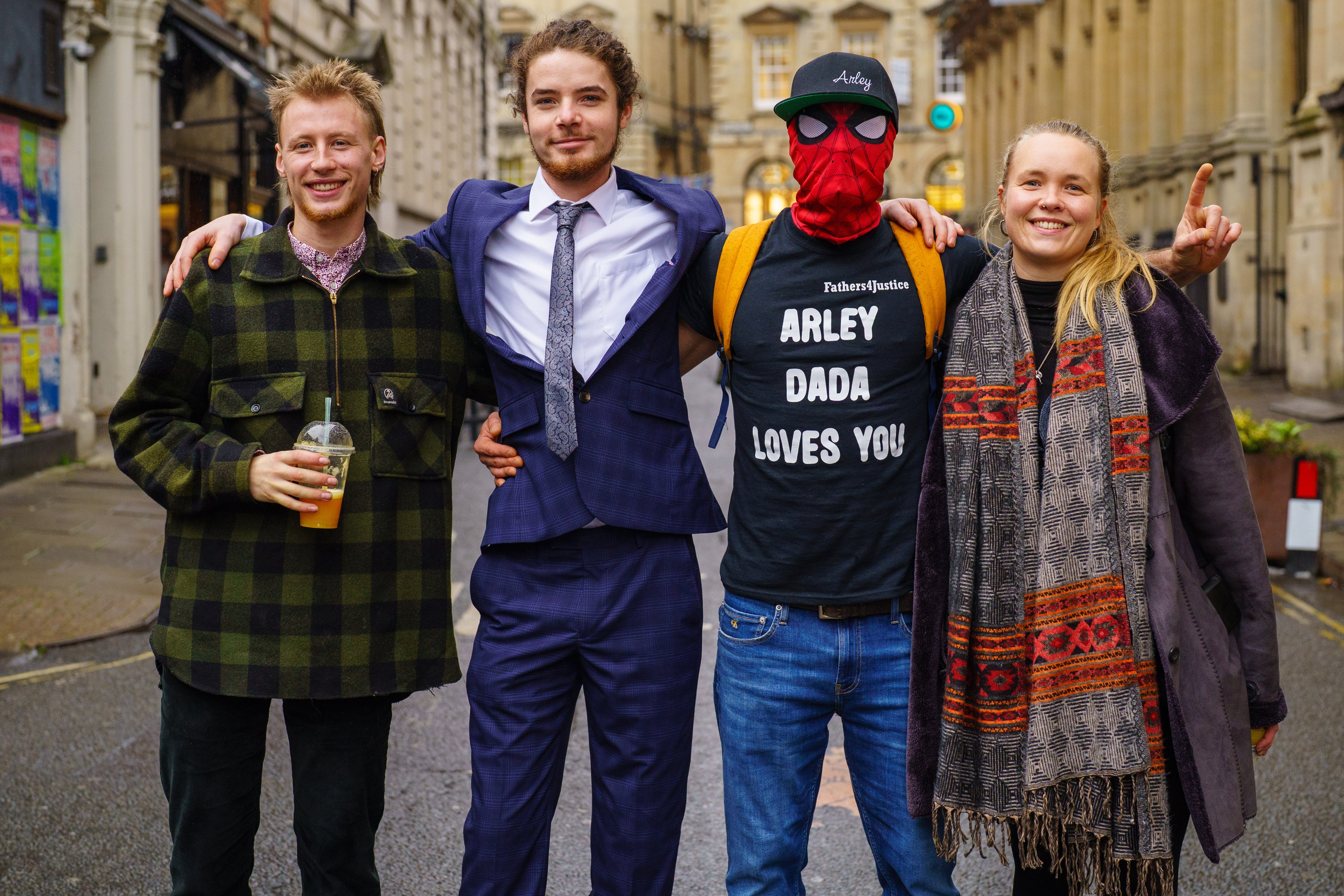 Milo Ponsford, left, Sage Willoughby, second left, Jake Skuse, second right in mask, and Rhian Graham outside Bristol Crown Court (Ben Birchall/PA)