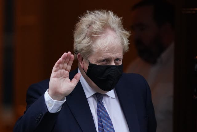 Prime Minister Boris Johnson leaves 10 Downing Street to attend Prime Minister’s Questions at the Houses of Parliament (Dominic Lipinski/PA)