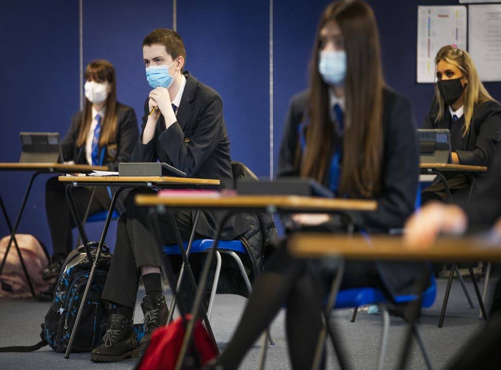 Secondary pupils in England will have to wear face masks in class when schools reopen (PA)
