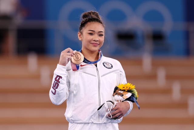 <p>Suni Lee addresses ‘hate’ she’s received since sharing relationship </p>