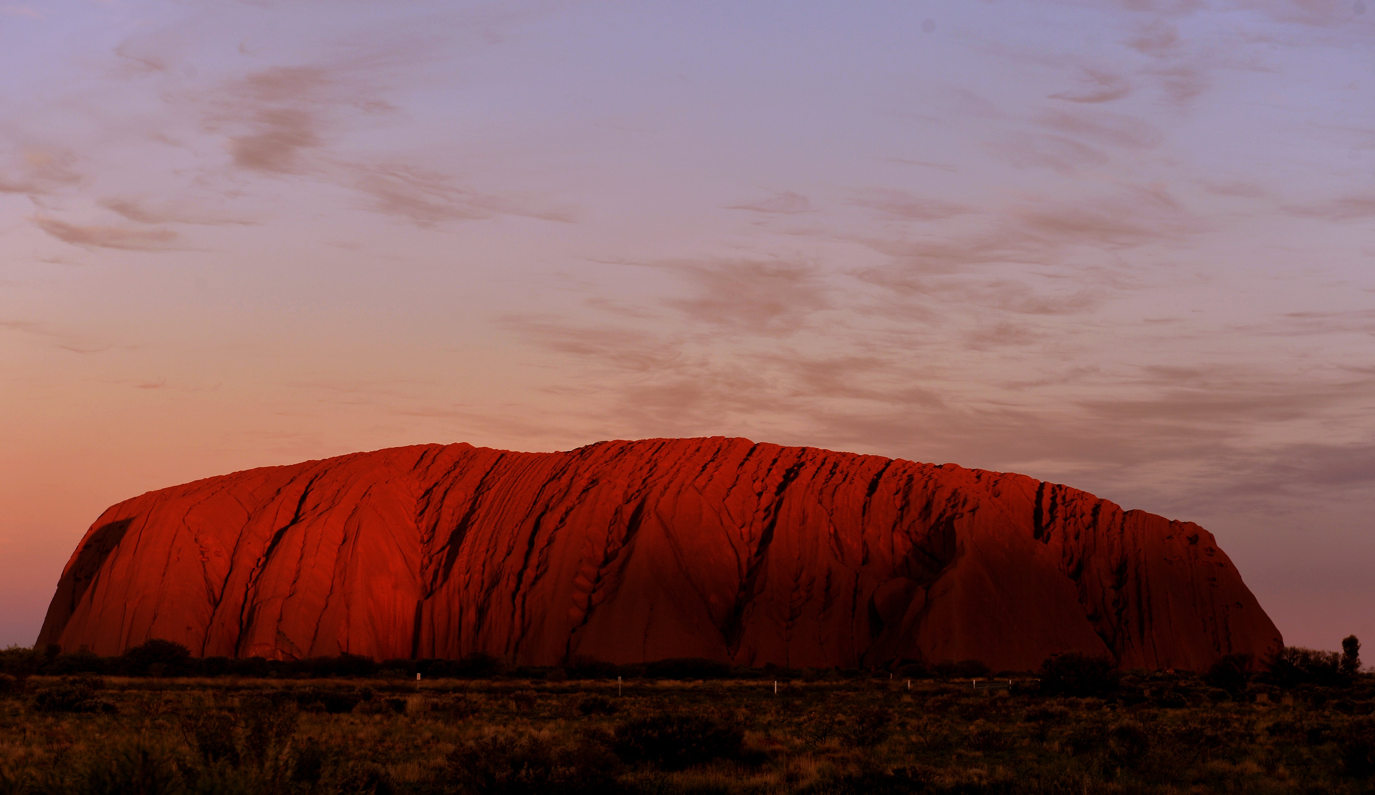 The sun sets at Uluru in the Northern Territory (Anthony Devlin/PA)