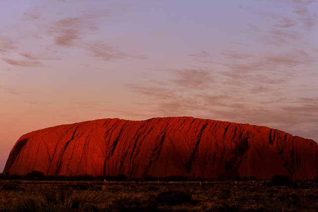 The sun sets at Uluru in the Northern Territory (Anthony Devlin/PA)