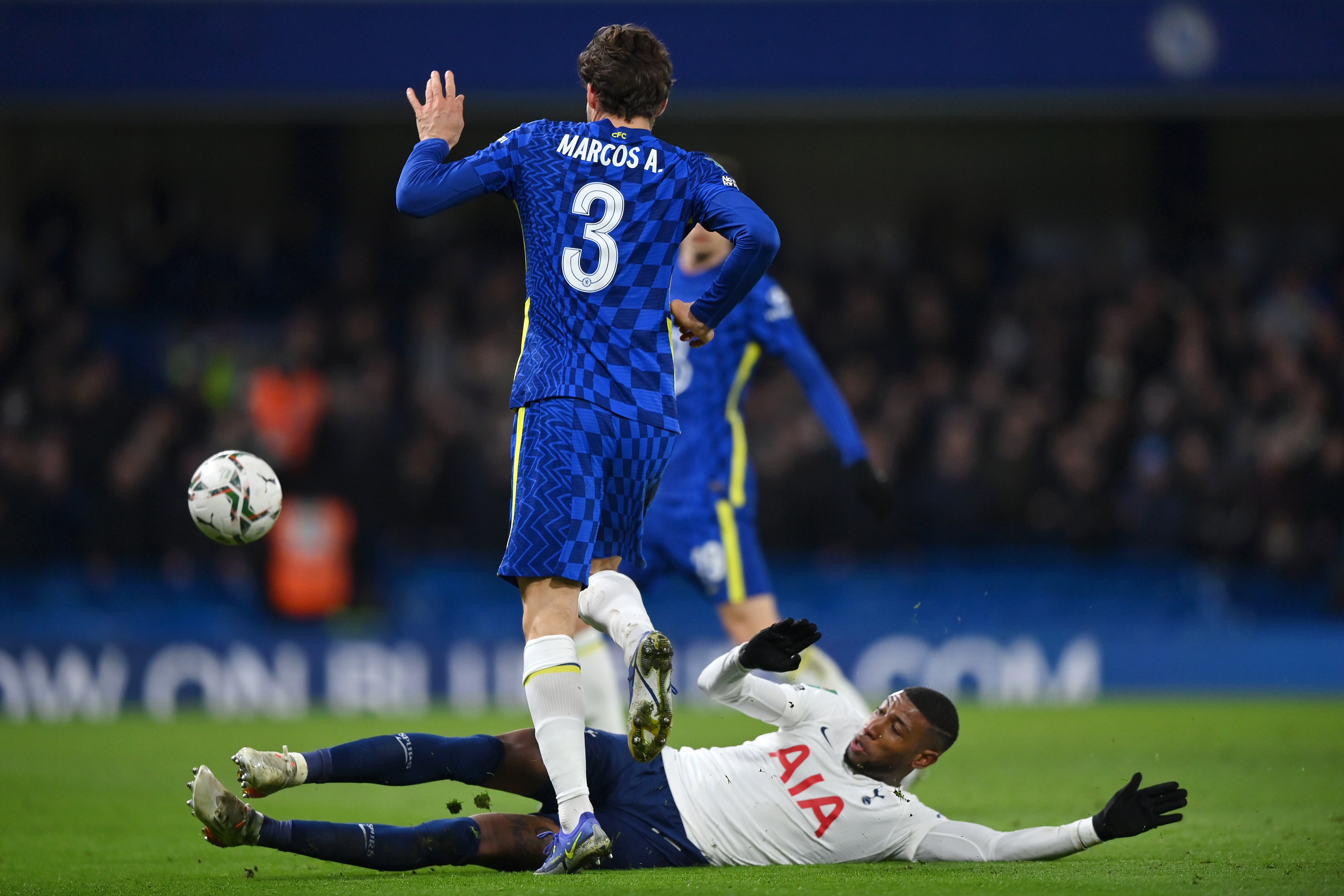 Marcos Alonso dribbles past Emerson Royal