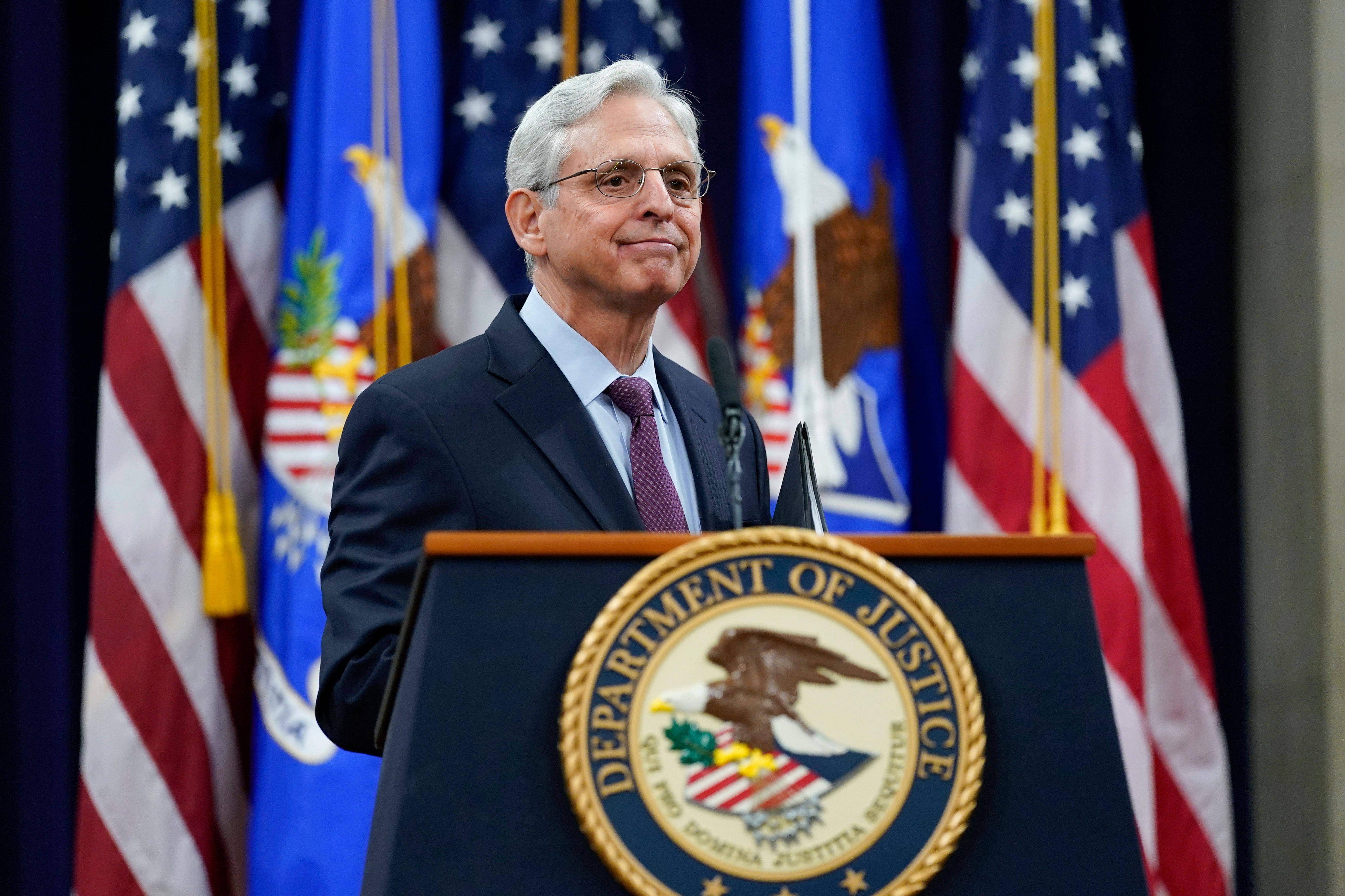 Attorney General Merrick Garland pauses as he finishes speaking at the Department of Justice in Washington, Wednesday, Jan. 5, 2022, in advance of the one year anniversary of the attack on the U.S. Capitol. (AP Photo/Carolyn Kaster, Pool)