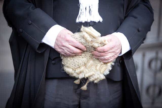 An advocate carries his wig outside Edinburgh Sheriff Court (Jane Barlow/PA)
