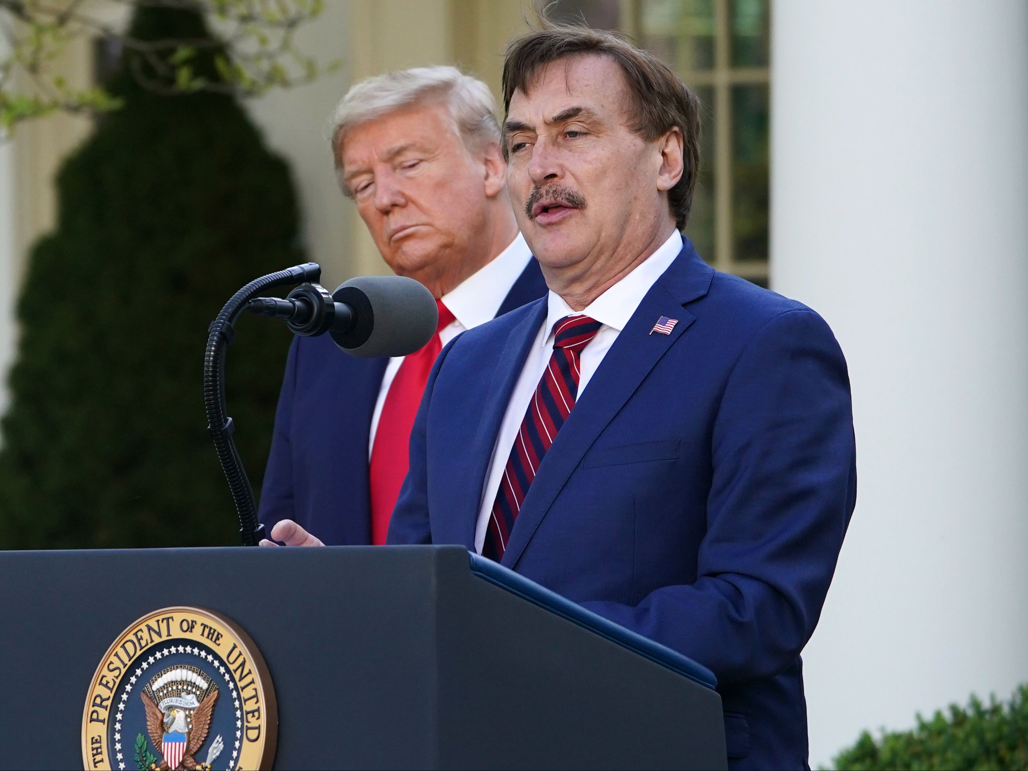 MyPillow CEO Mike Lindell appears with Donald Trump at the White House.