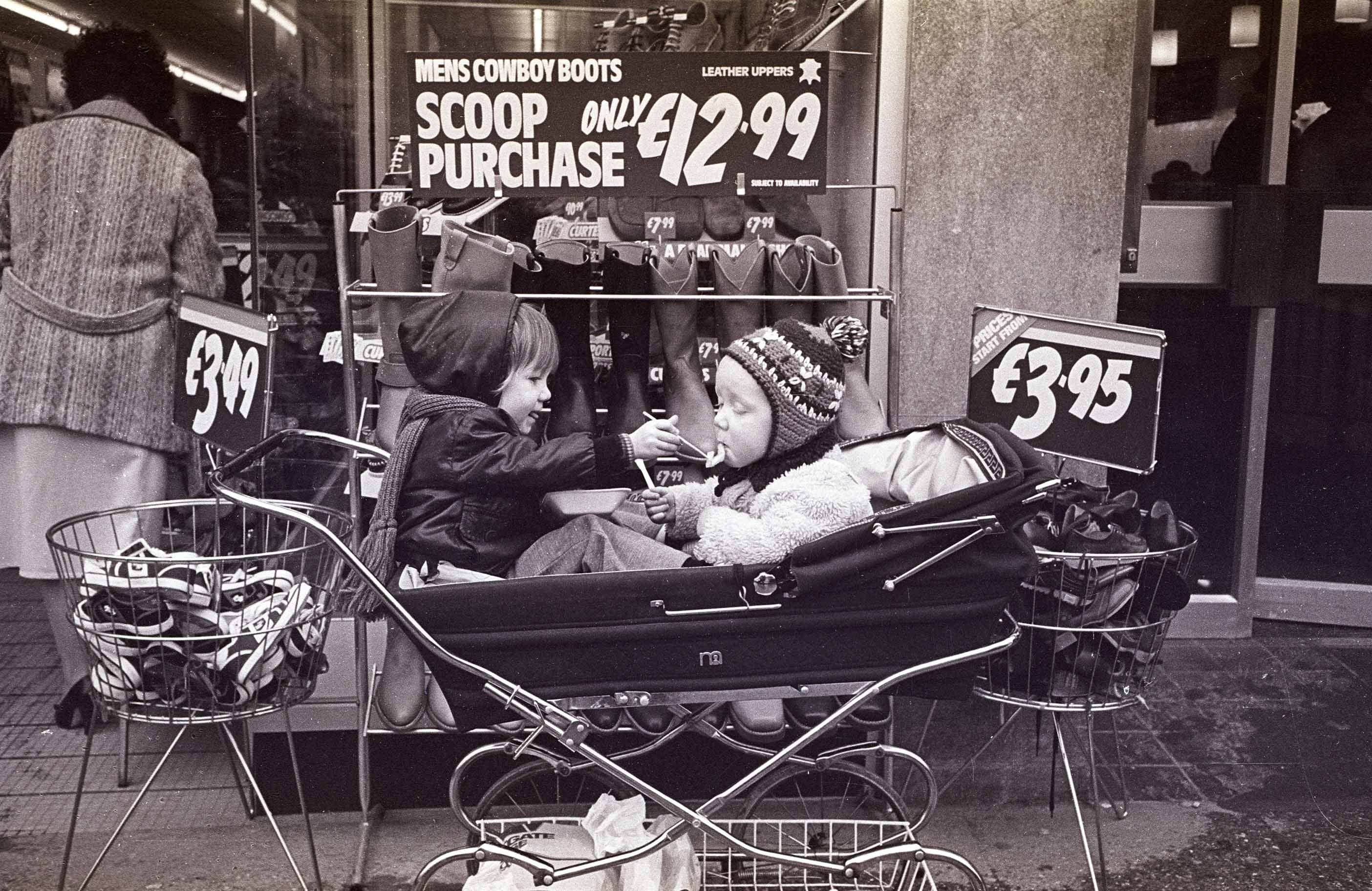 Brothers Mark and Matt Court photographed outside a shop in 1980