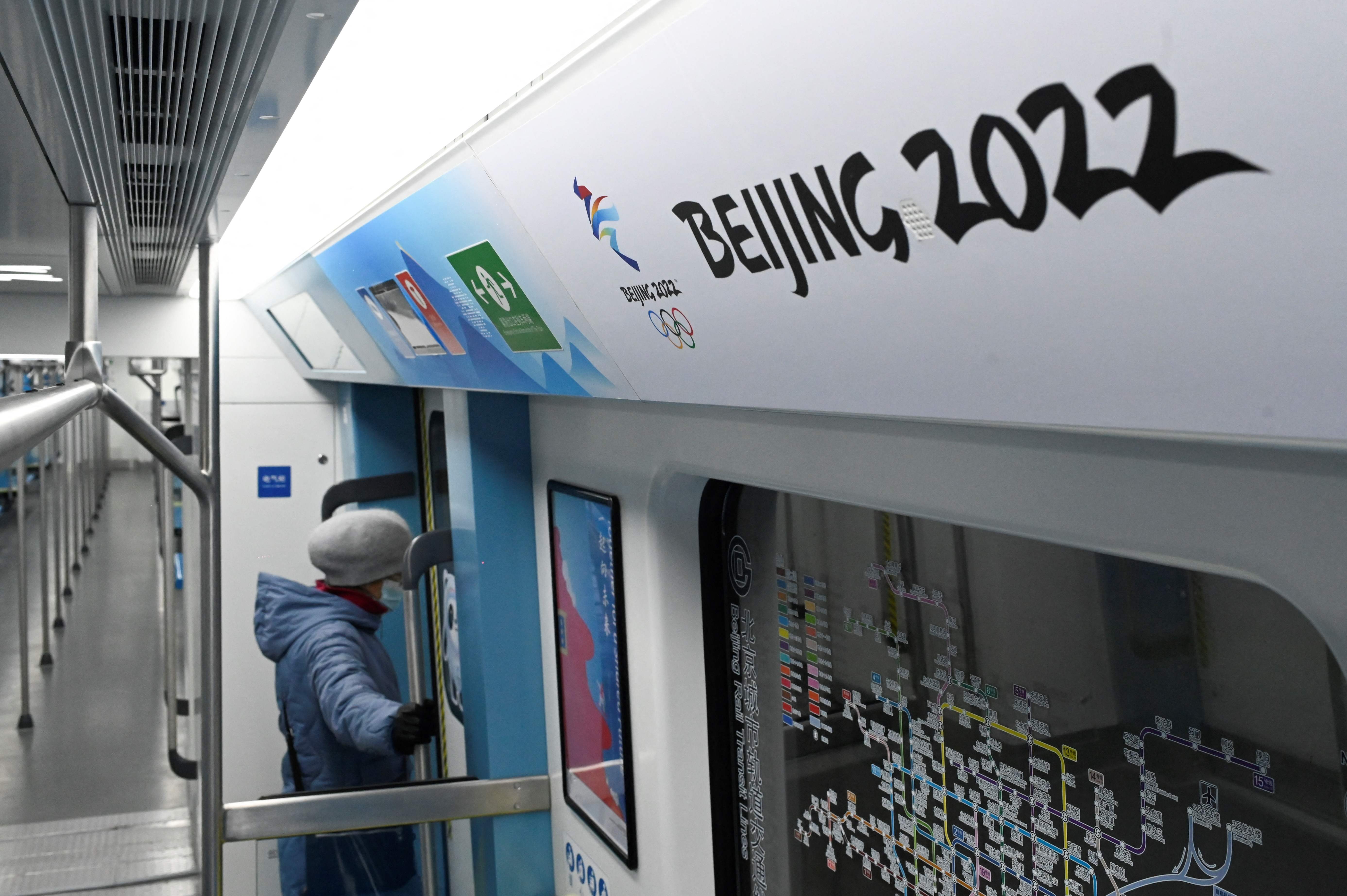Signage for the 2022 Winter Olympic Games displayed on a subway train in Beijing