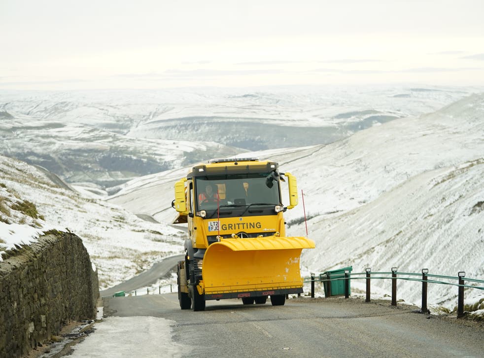 A snowplough on Buttertubs Pass near Hawes in the Yorkshire Dales (Danny Lawson/PA)