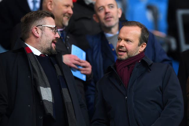 <p>Manchester United executives Richard Arnold (left) and Ed Woodward</p>