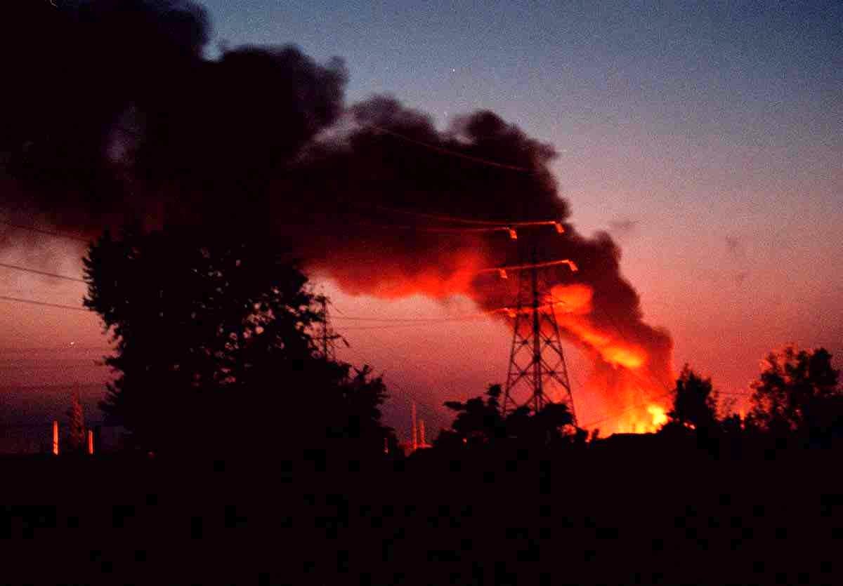 Flames and smoke rise from an electric power plant in Belgrade's suburb Bezanijska Kosa in May 1999 after the plant was hit by a Nato missile