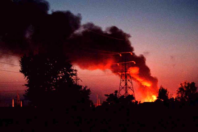 <p>Flames and smoke rise from an electric power plant in Belgrade's suburb Bezanijska Kosa in May 1999 after the plant was hit by a Nato missile</p>
