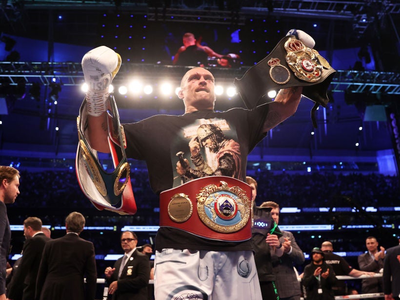 <p>Usyk currently holds three of the four recognised world heavyweight titles</p>