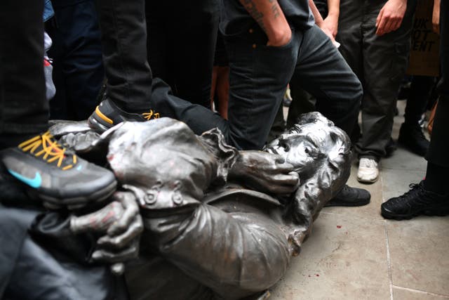 <p>The statue of Edward Colston was toppled during a Black Lives Matter protest rally in Bristol in June 2020 (Ben Birchall/PA)</p>
