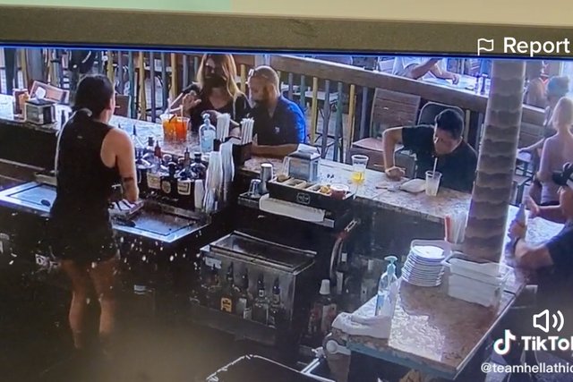 <p>A Florida bartender uploaded security footage from her workplace on her TikTok, showing a woman throwing a drink at her after she got angry that a bug flew in it </p>