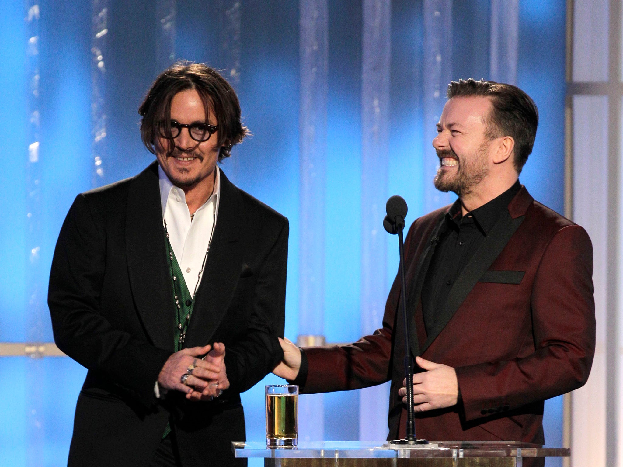 ‘The Tourist’ nominee Johnny Depp and recurring Golden Globes host Ricky Gervais at the 2012 Globes
