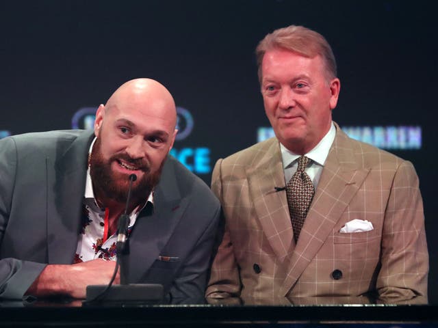 <p>Frank Warren (right) does not want British judges deciding the fight between Tyson Fury (left) and Dillian Whyte </p>