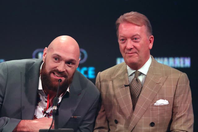 <p>Frank Warren (right) does not want British judges deciding the fight between Tyson Fury (left) and Dillian Whyte </p>