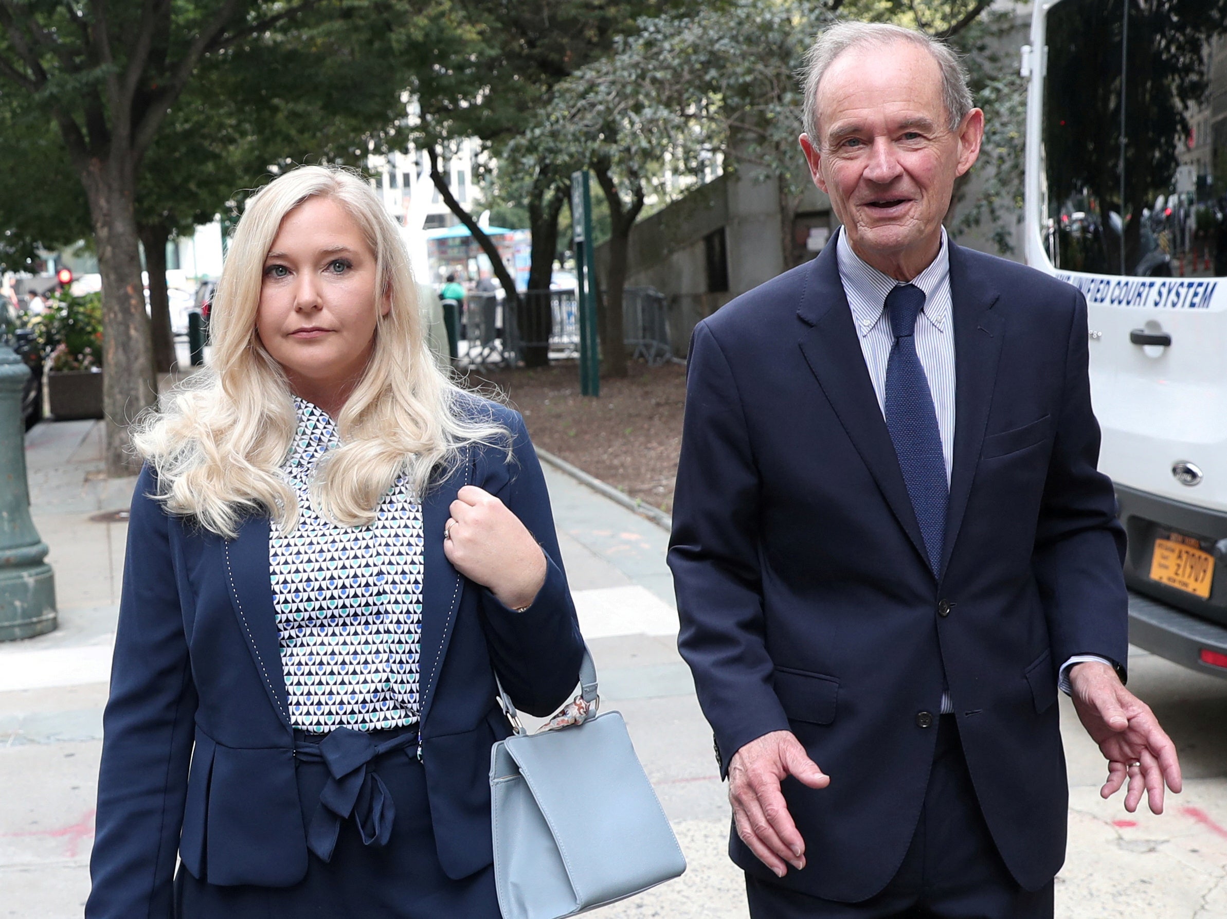 Virginia Giuffre arriving at court in New York with her lawyer David Boies in August 2019