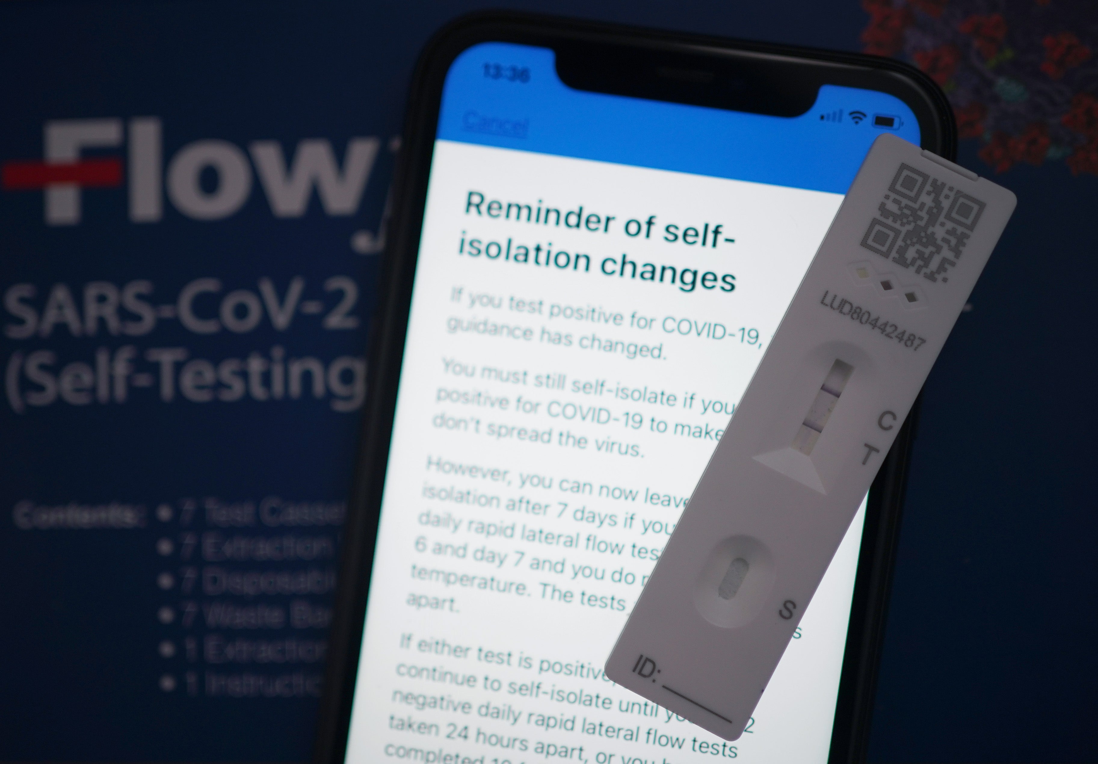 A positive lateral flow test cassette (Yui Mok/PA)