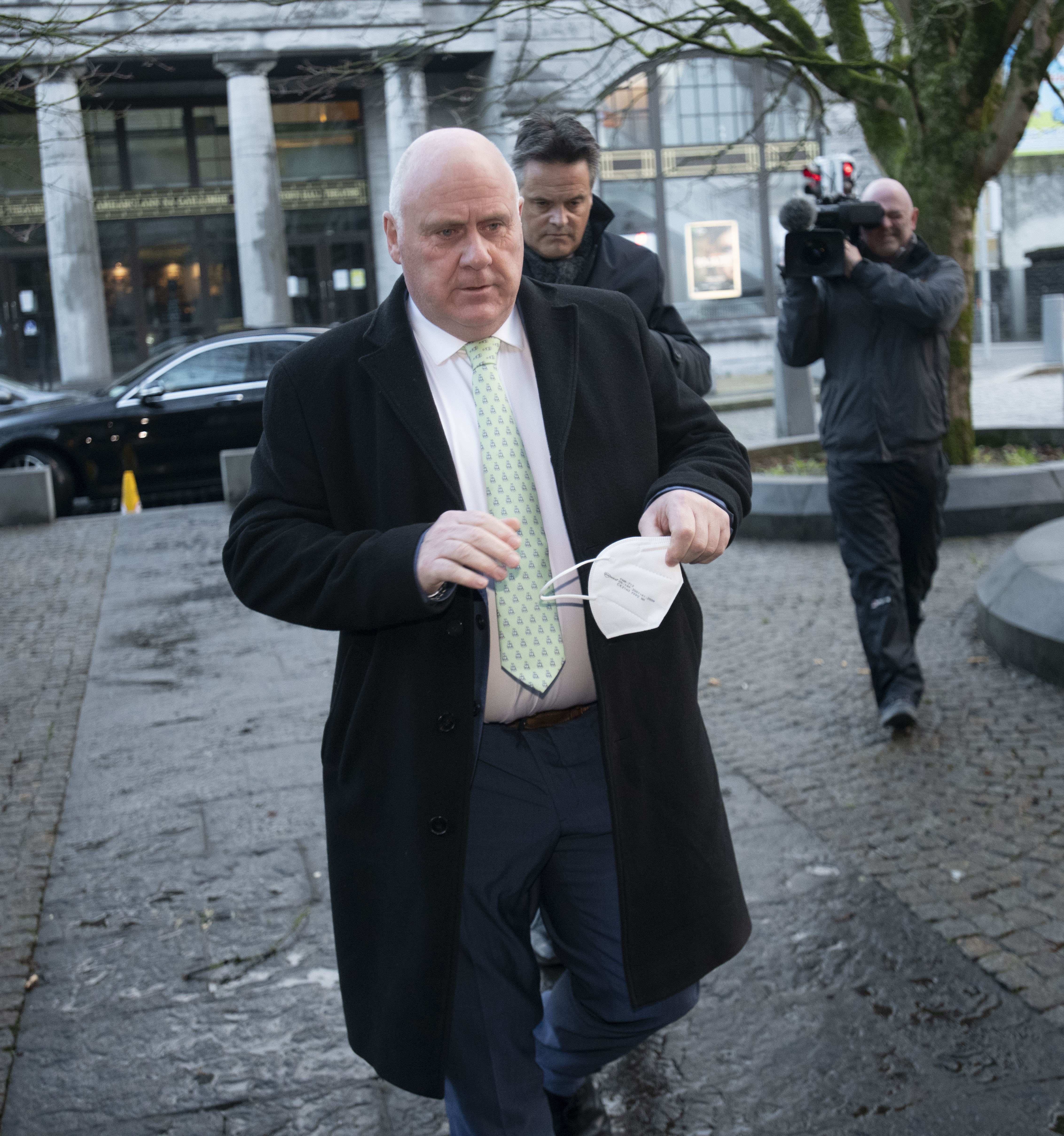 Galway East Independent TD Noel Grealish, 55, leaves Galway District Court after attending a hearing where he is one of four people accused to have breached Covid restrictions by organising a golf society dinner (PA)
