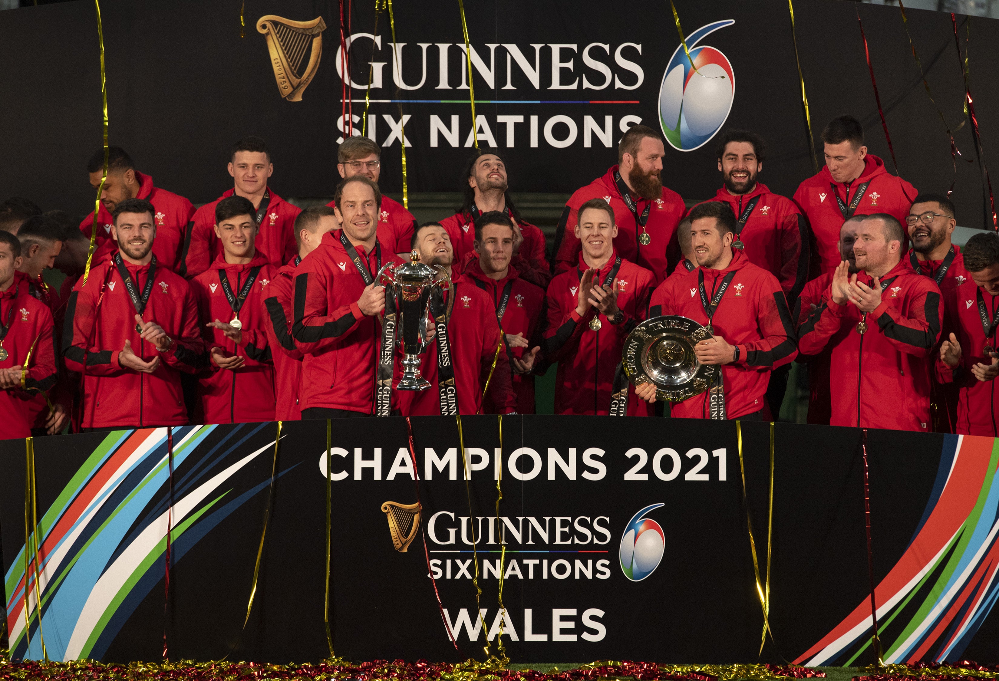 Handout photo provided by The WRU of Wales lift both the Triple Crown trophy and the Guinness Six Nations Trophy after being crowned Six Nations champions (Ben Evans/PA)