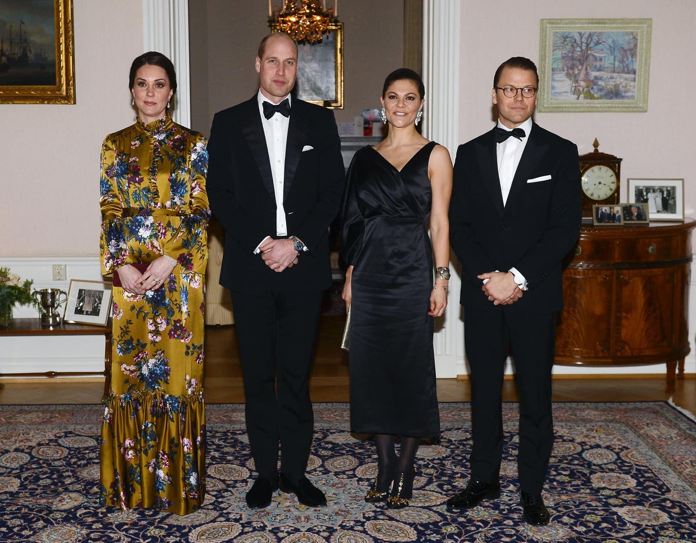 Kate wears mustard yellow and blue Erdem gown