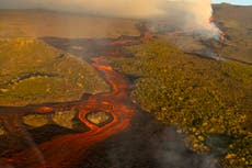 Tallest Galapagos volcano erupts, spewing lava, ash