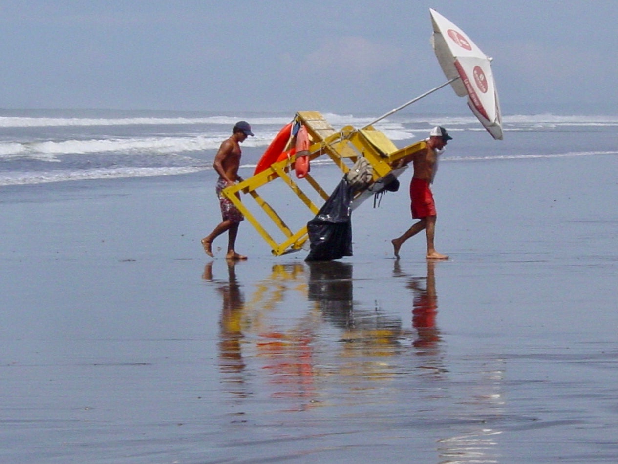 Homeward bound: lifeguards on Costa Rica’s Pacific coast, from where 292 passengers are currently isolating after their plane landed 13 minutes too early at Gatwick