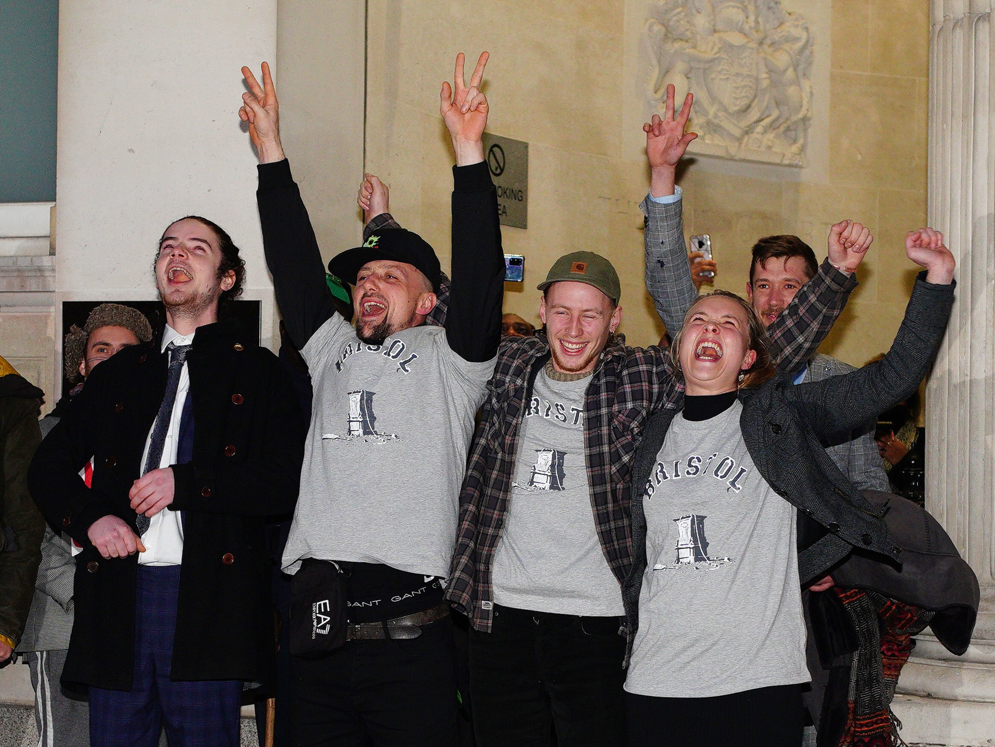 Sage Willoughby, Jake Skuse, Milo Ponsford and Rhian Graham outside Bristol Crown Court after being cleared of criminal damage for pulling down a statue of slave trader Edward Colston