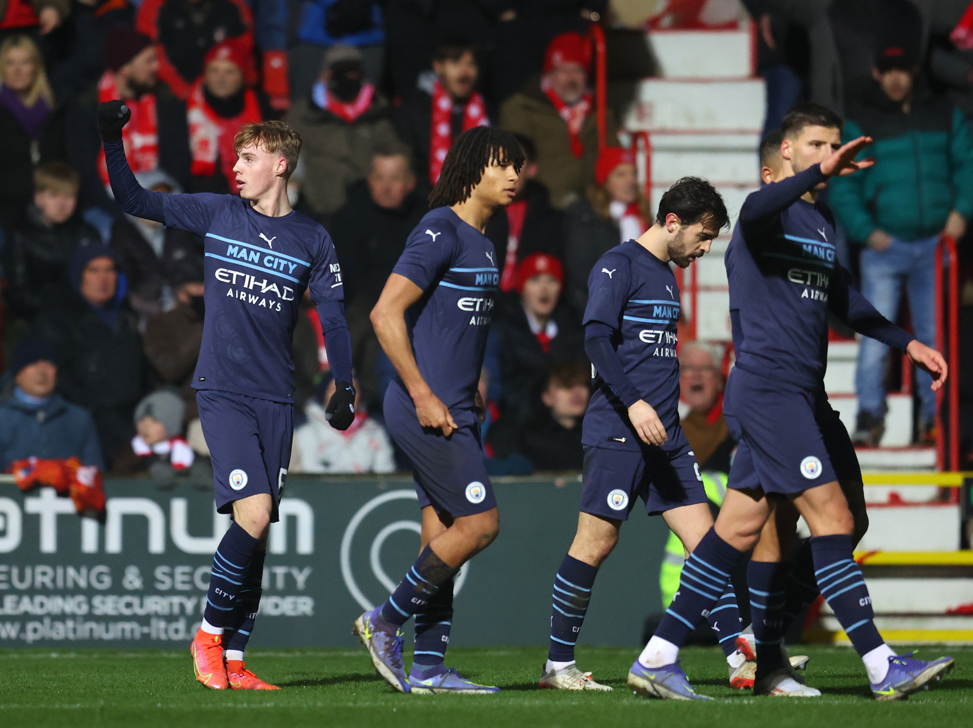 Cole Palmer celebrates scoring Manchester City’s fourth goal at Swindon