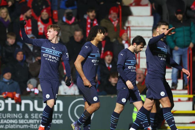 <p>Cole Palmer celebrates scoring Manchester City’s fourth goal at Swindon</p>