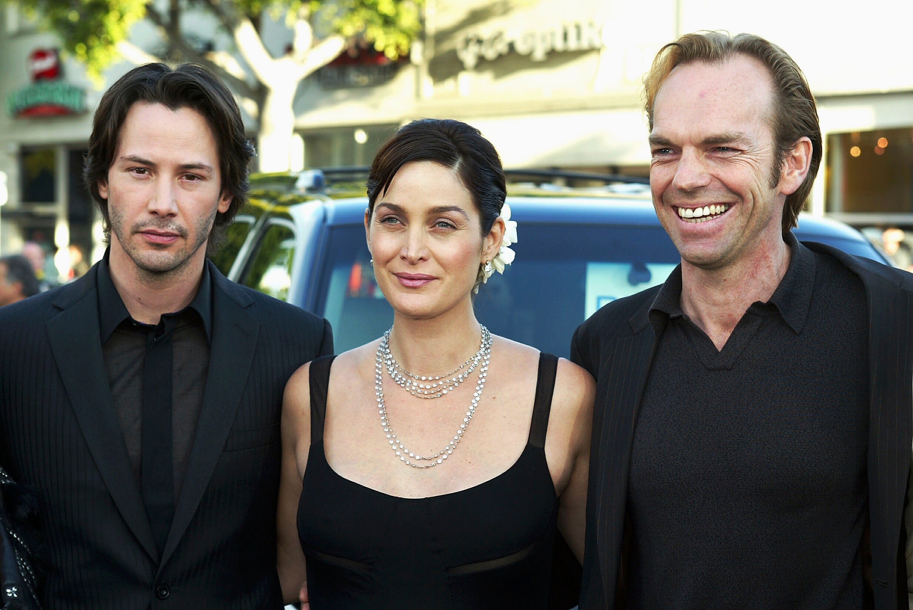 Keanu Reeves, Carrie-Anne Moss, and Hugo Weaving at the premiere of ‘The Matrix Reloaded’ on 7 May 2003 in Los Angeles