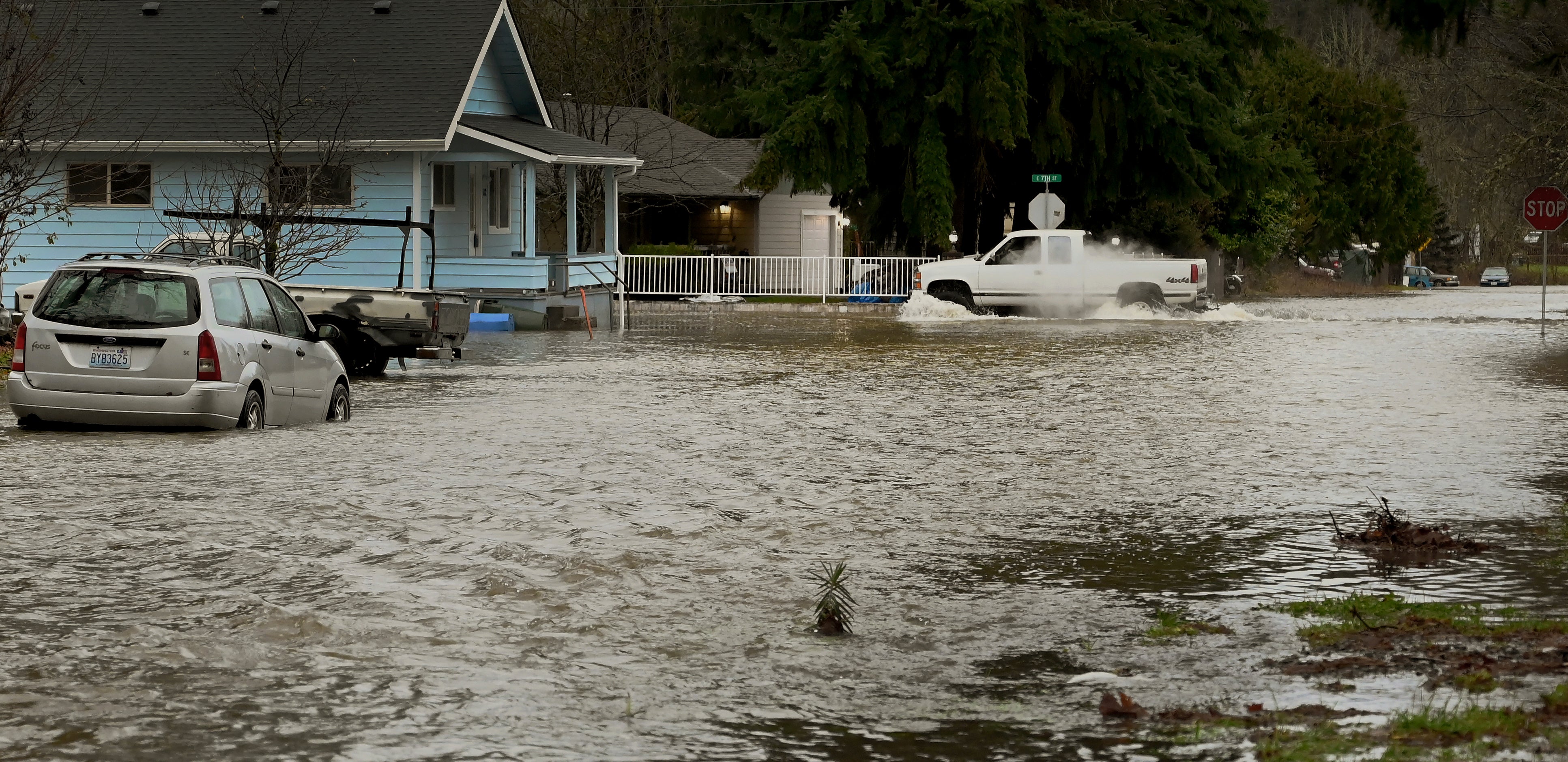 Pacific Northwest storm causes flooding, slides, shuts roads The