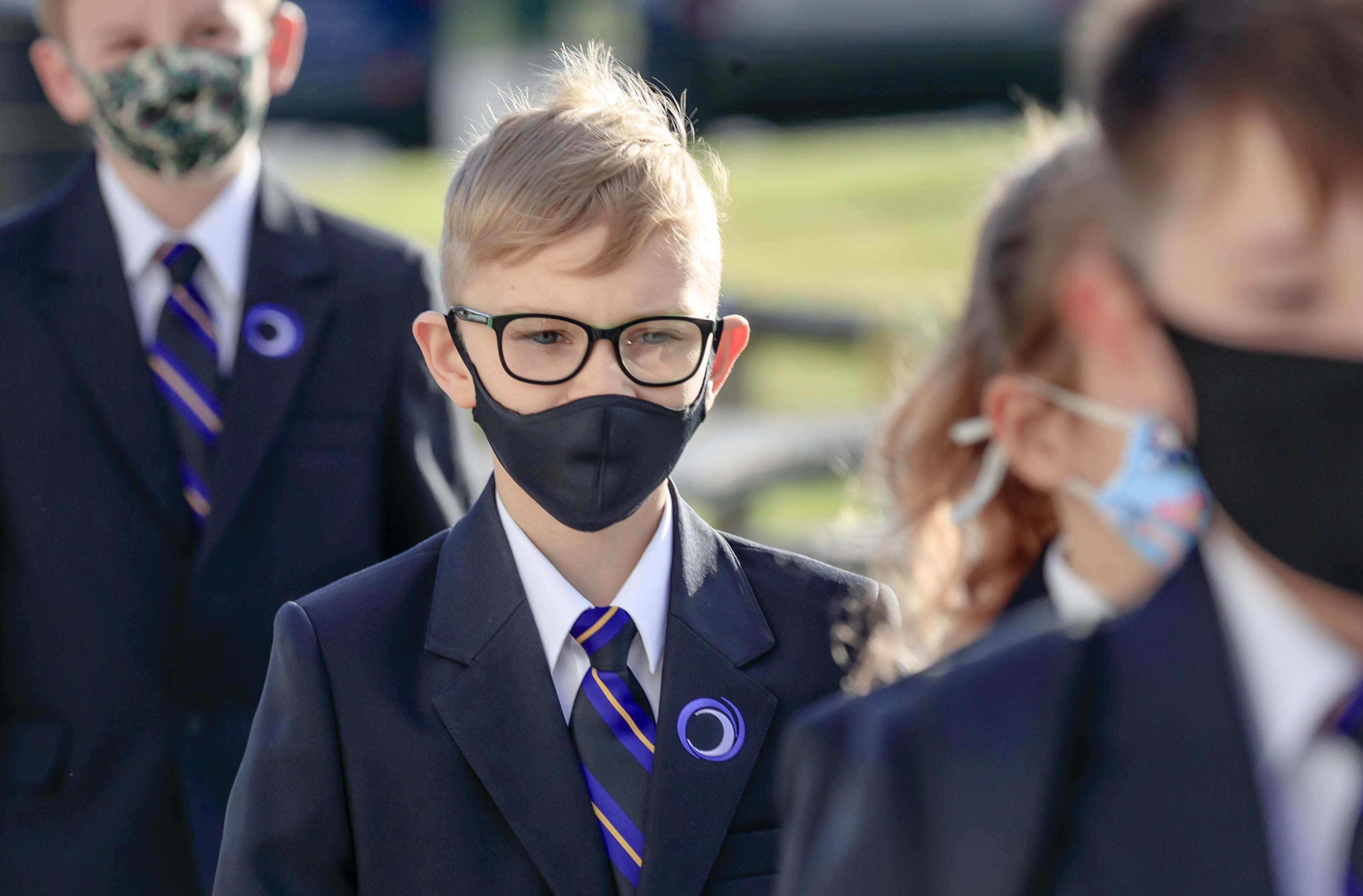 Pupils wearing protective face masks (PA)