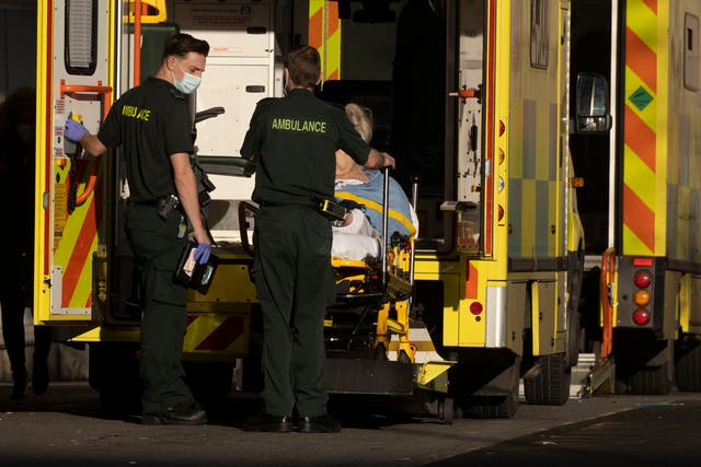 <p>Ambulance crew move patients at the Royal London Hospital on January 07, 2022 in London, England.</p>