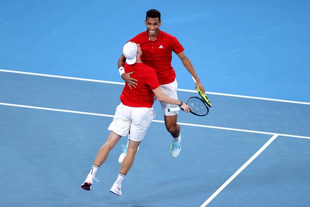 <p>Denis Shapovalov and Felix Auger-Aliassime celebrate their win</p>