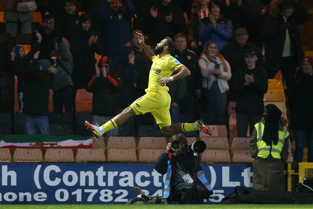 Bryan Mbeumo celebrates his first goal against Port Vale (Nigel French/PA)