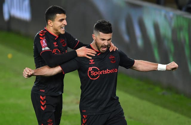 Shane Long (right) celebrates Southampton’s FA Cup winner with Mohamed Elyounoussi at Swansea (Simon Galloway/PA)