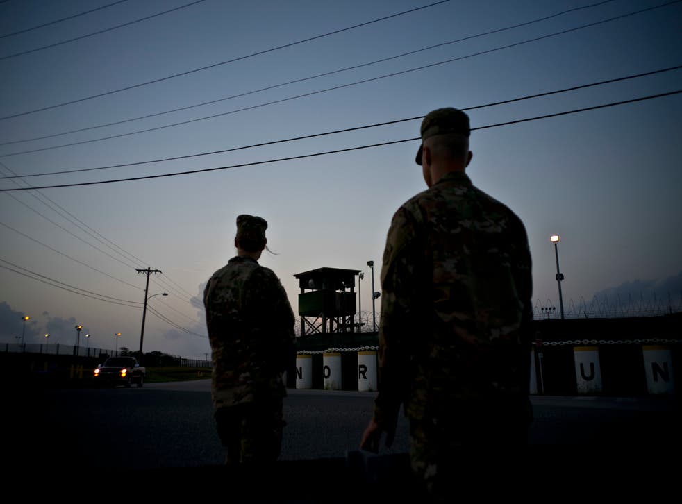 <p>Troops stand guard outside Camp Delta at the Guantanamo Bay detention centre in Cuba </p>