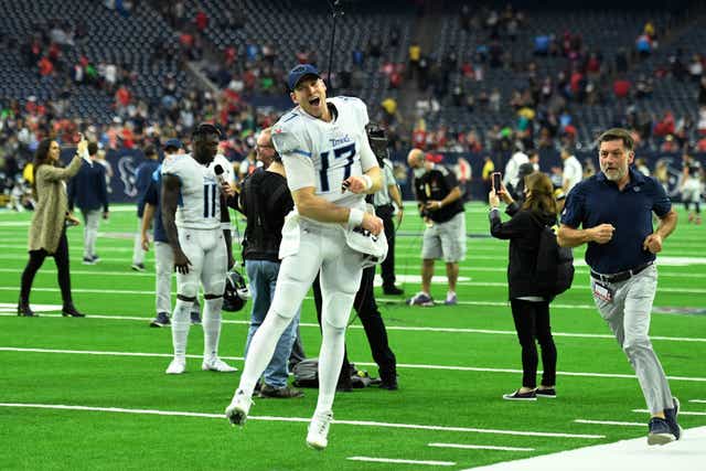Tennessee Titans quarterback Ryan Tannehill (17) celebrates with fans after their win over the Houston Texans (Justin Rex/AP)