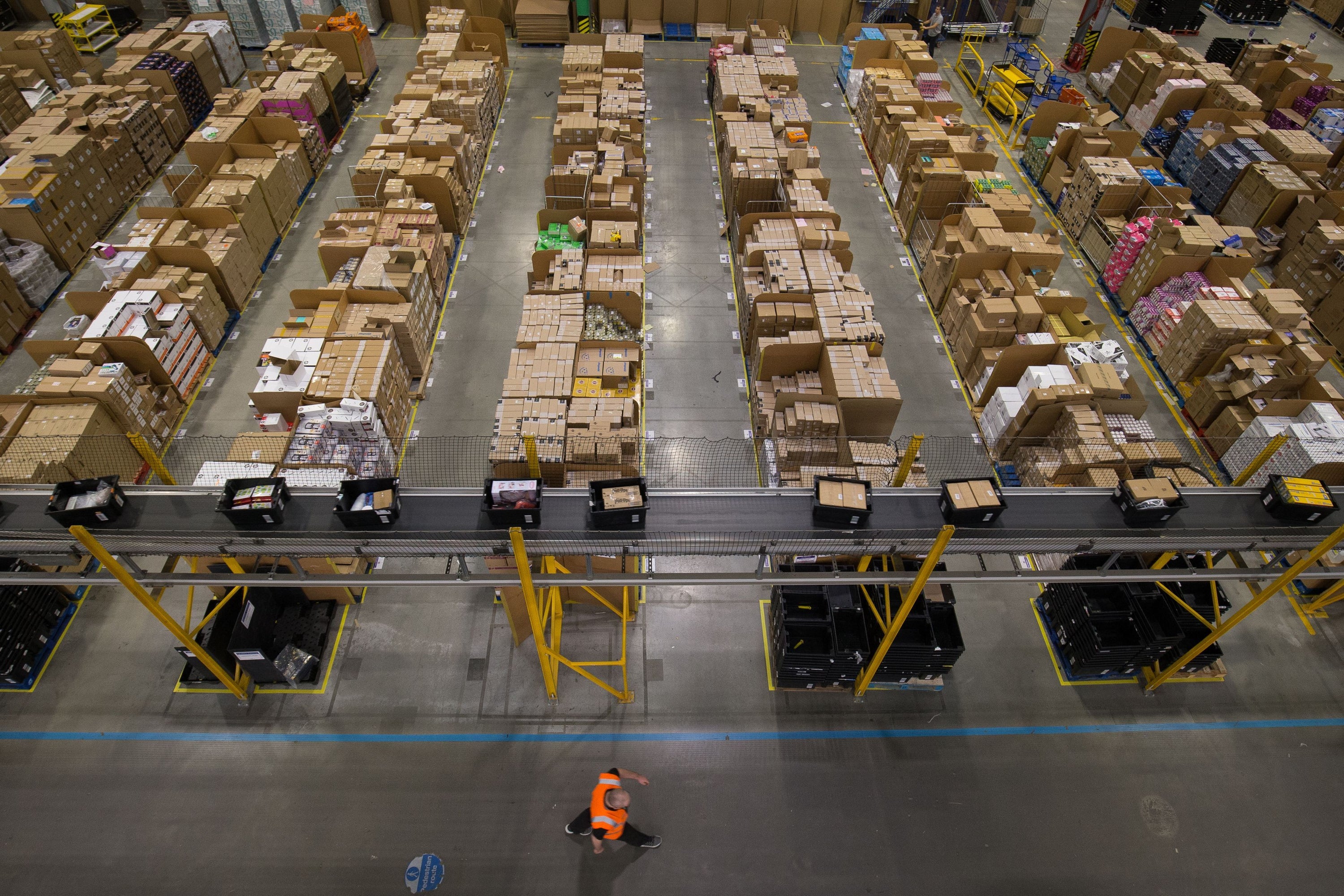 Parcels are processed and prepared for dispatch at Amazon’s Fulfilment Centre at Kingston Park in Peterborough (Aaron Chown/PA)
