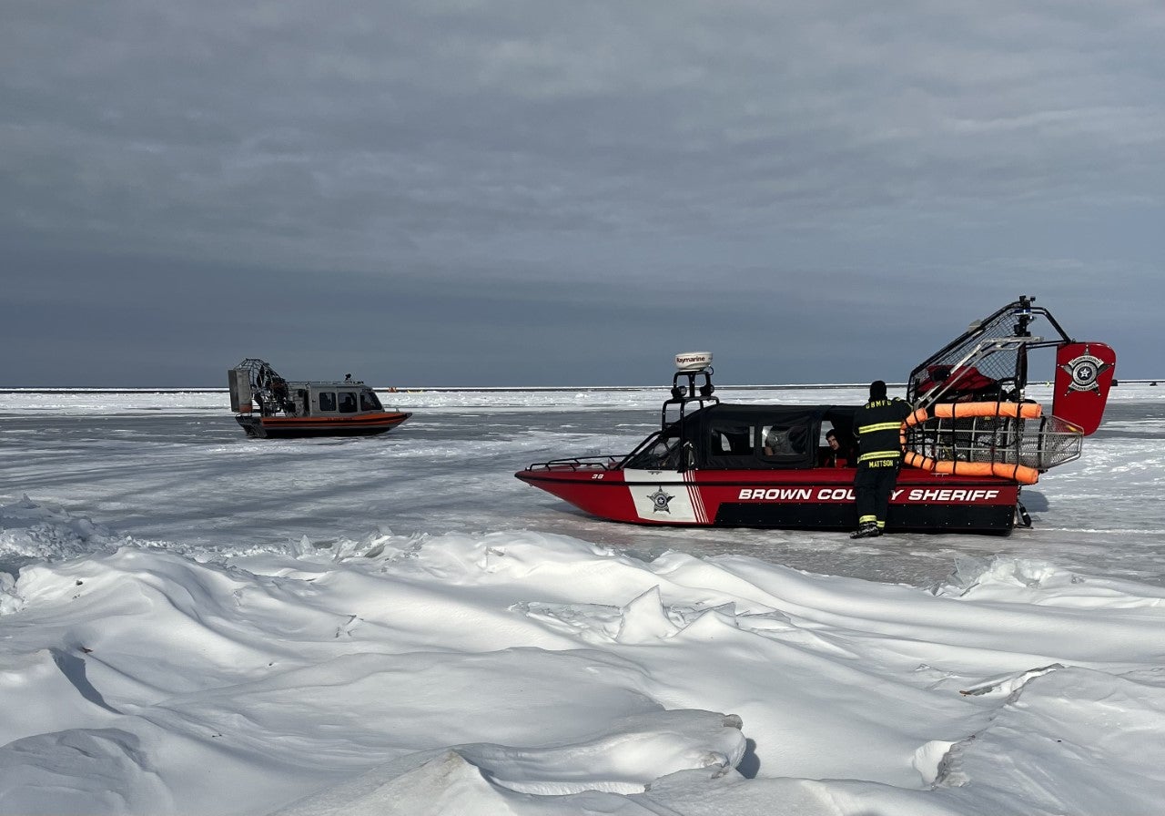 Sheriff deputies in Green Bay after the successful rescue of 27 people on 8 January