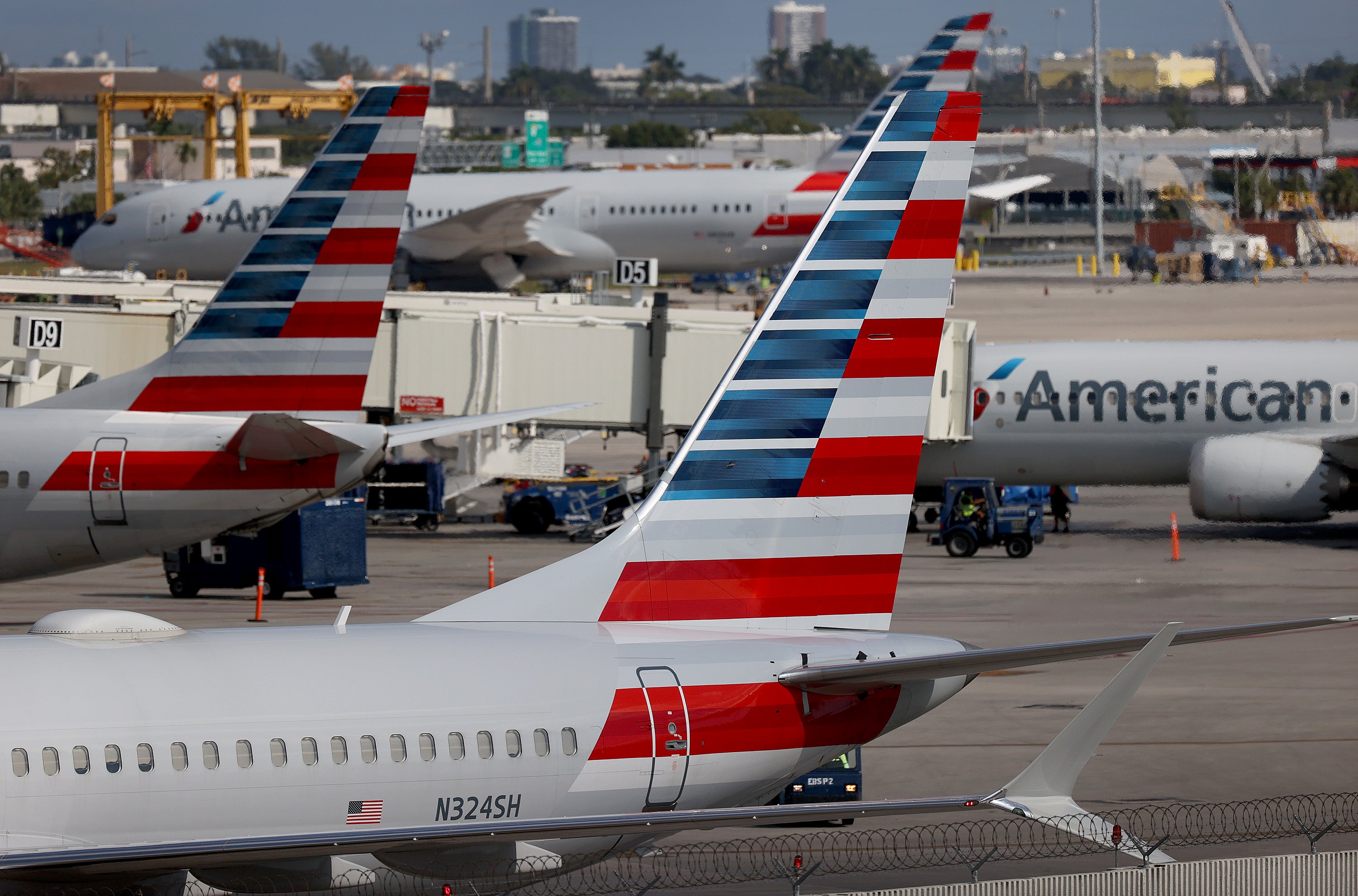 File: American Airlines planes parked at their gates in the Miami International Airport on 10 December 2021 in Miami, Florida