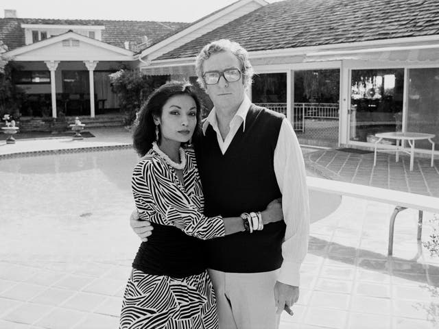 <p>Michael Caine with his wife, Shakira, in 1984</p>