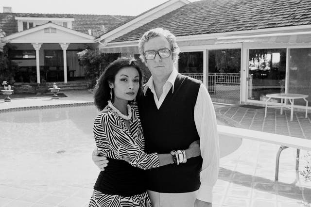 <p>Michael Caine with his wife, Shakira, in 1984</p>