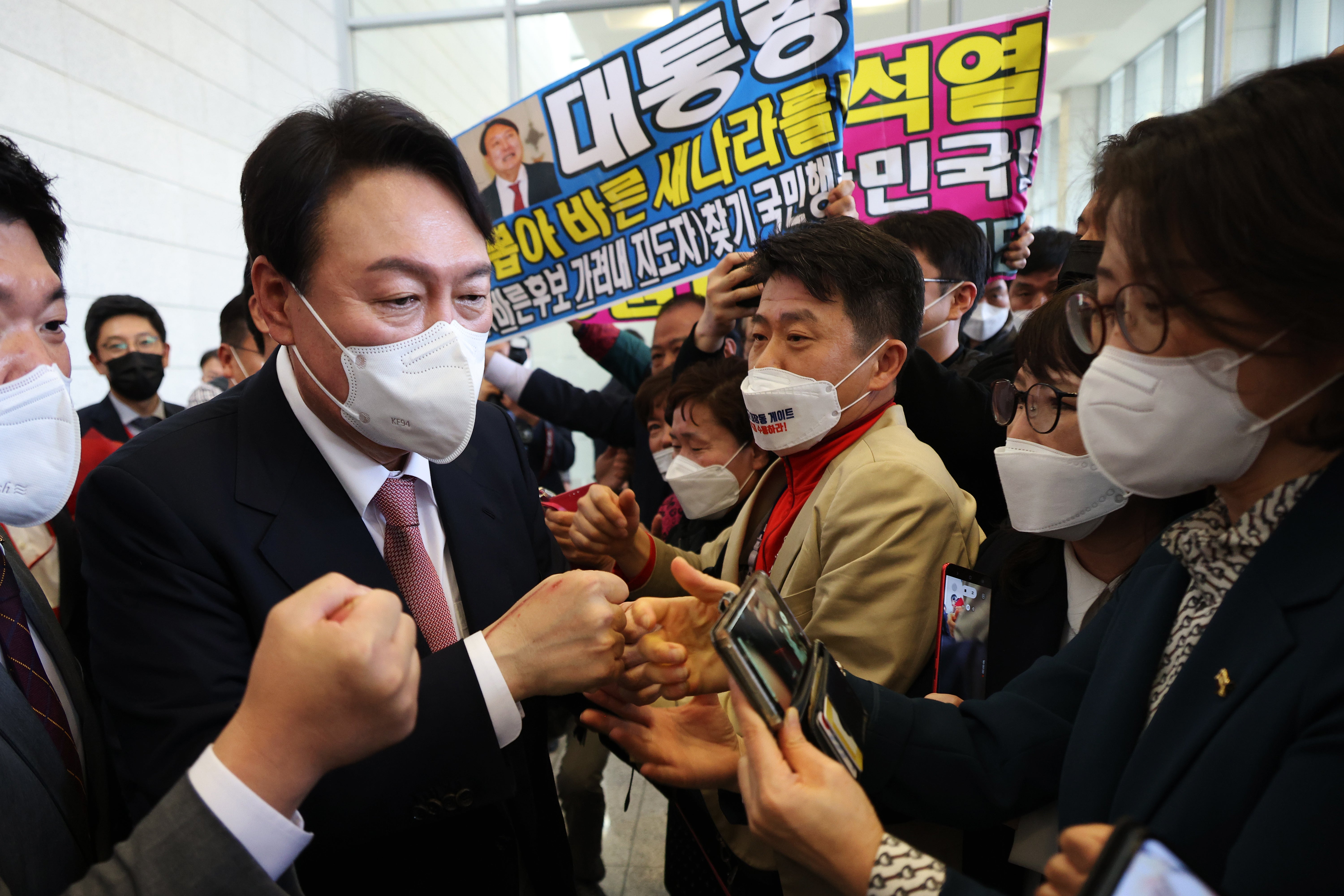 File photo: Presidential election candidate Yoon Seok-Youl celebrates with his supporters in Seoul, South Korea, 5 November 2021