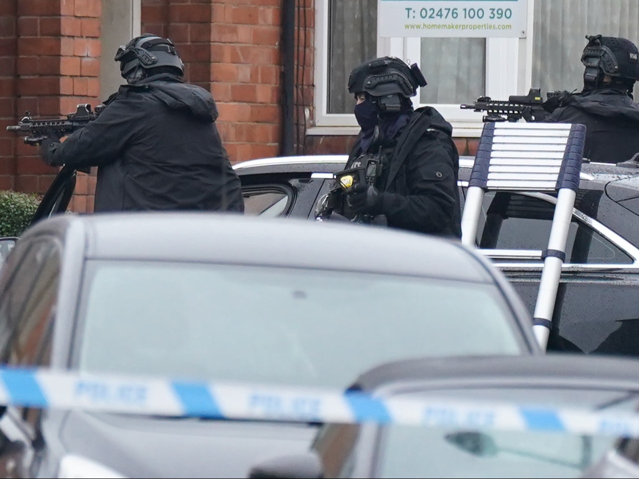 Armed police are involved in a standoff with a man refusing to leave a house in Coventry with his eight-year-old son