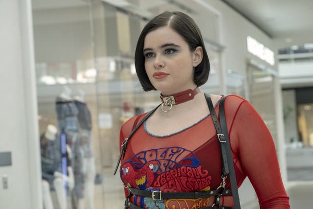 <p>Kat wears a harness to the mall</p>