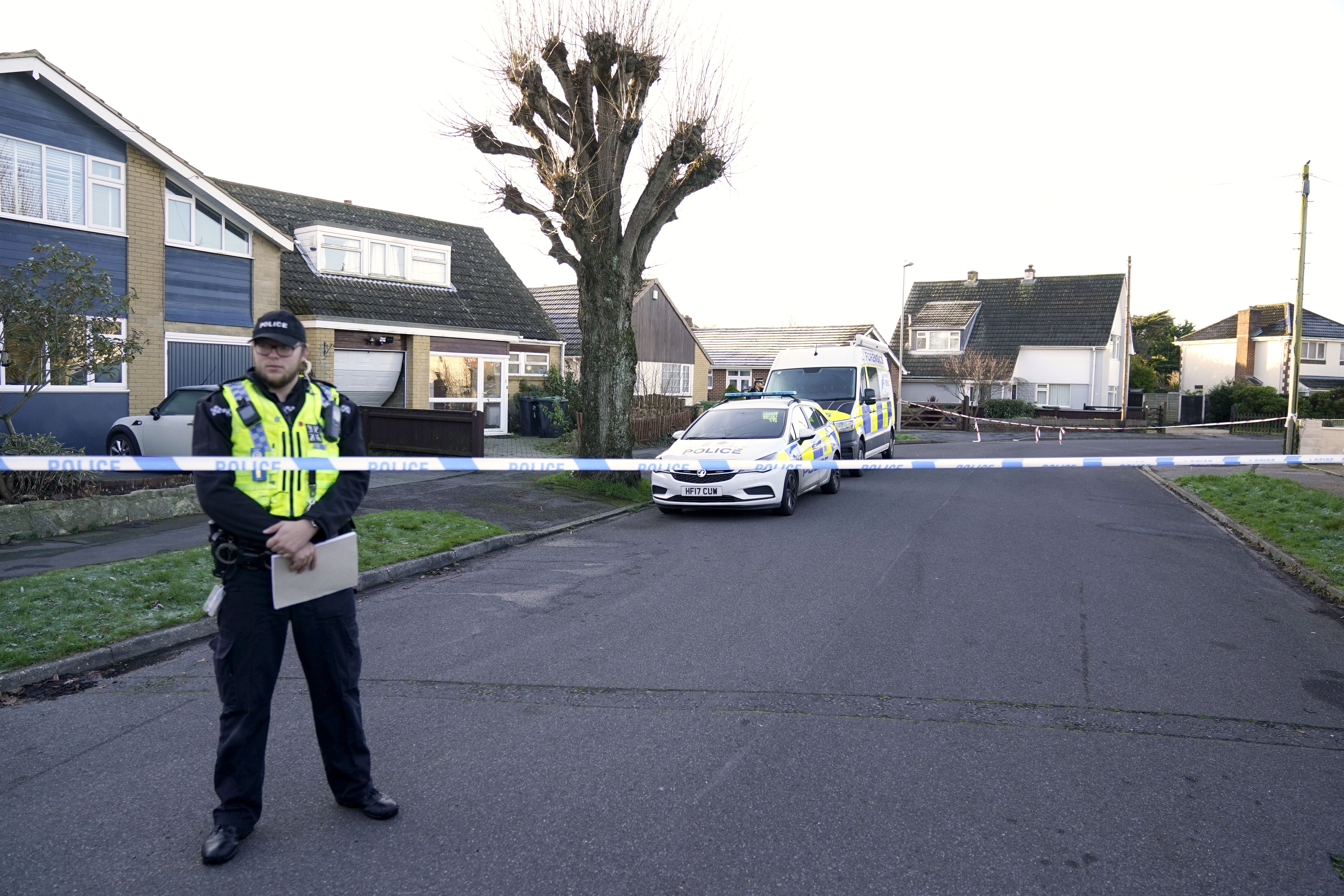 Police at the scene in Heath Road, Christchurch, Dorset (Andrew Matthews/PA)